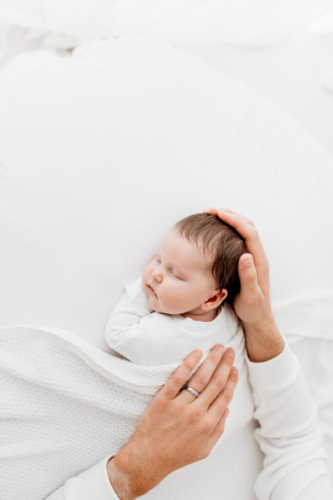 Sleeping newborn on a photoshoot