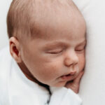Newborn baby on natural photoshoot