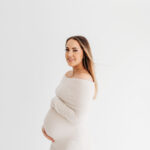 Gorgeous pregnant young mother on her natural maternity shoot