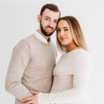 Gorgeous couple who are expecting a baby on their pregnancy photoshoot