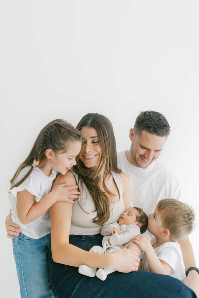 Beautiful newborn baby with family on a photoshoot in Cheshire