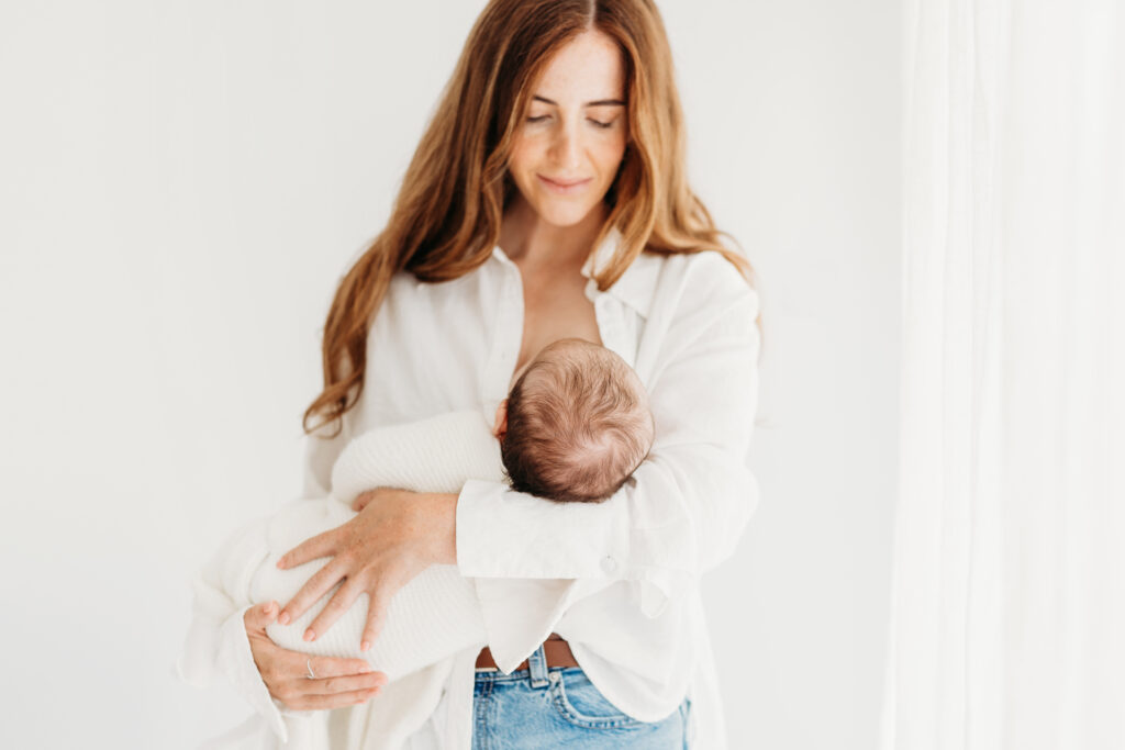 Wilmslow photography studio newborn photoshoot newborn with mother