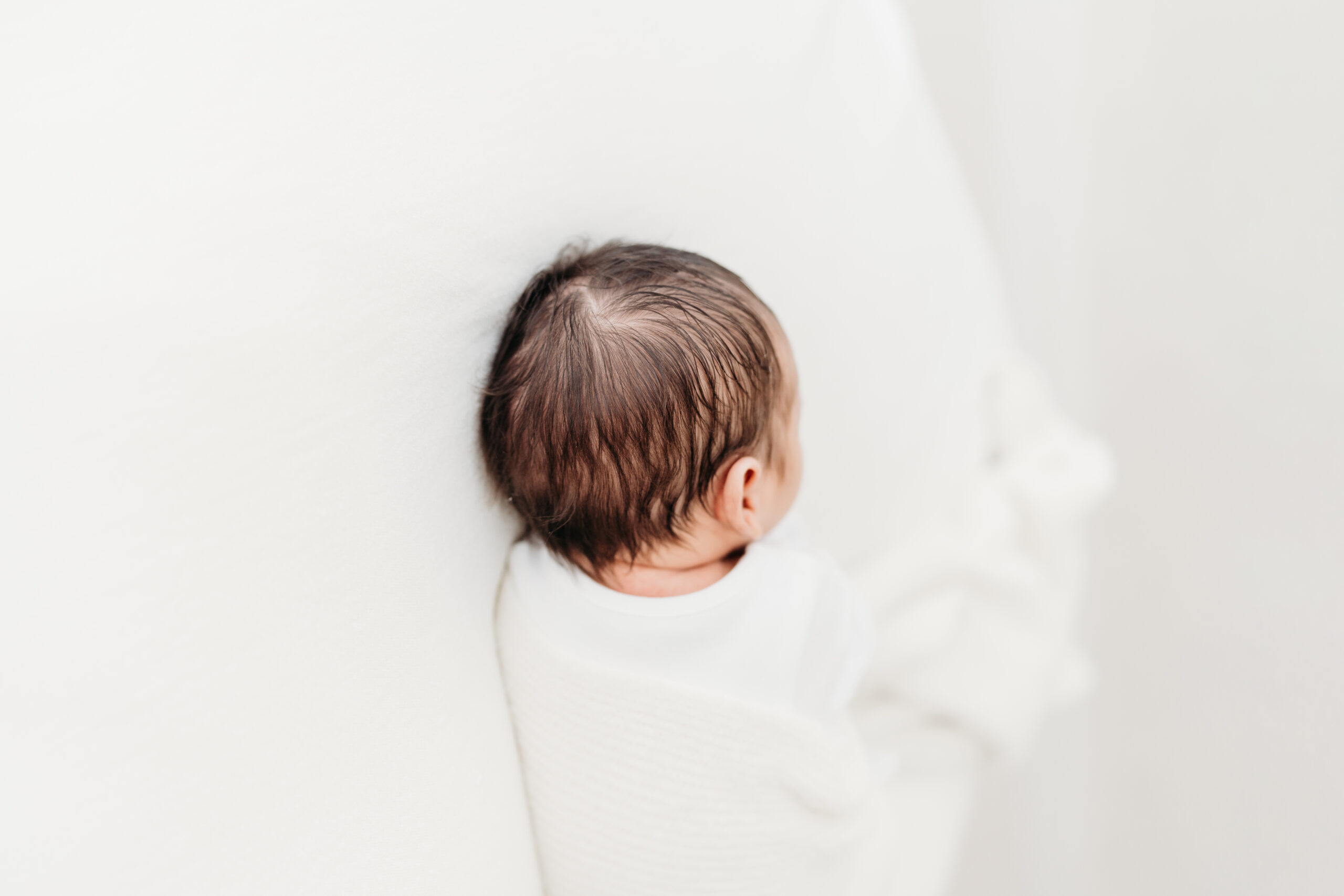 Sleeping baby on a natural newborn photoshoot in Cheshire